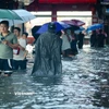 Một tuyến phố của Hà Nội bị ngập sâu sau cơn mưa lớn. (Ảnh: Hoài Nam/Vietnam+)