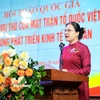 Bà Hà Thị Nga, Ủy viên Trung ương Đảng, Phó Chủ tịch Ủy ban Trung ương Mặt trận Tổ quốc Việt Nam phát biểu khai mạc Hội thảo. (Ảnh: Hoài Nam/Vietnam+)