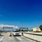 Thu phí tự động không dừng trên tuyến cao tốc Vĩnh Hảo-Phan Thiết. (Ảnh: PV/Vietnam+)