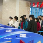 Hà Nội Metro chính thức áp dụng hệ thống kiểm soát vé tự động mới trên tuyến Cát Linh-Hà Đông. (Ảnh: Việt Hùng/Vietnam+)