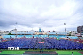 8.800 tình nguyện viên áo xanh sẵn sàng phục vụ lễ kỷ niệm. (Ảnh: Mai Chi/TTXVN)