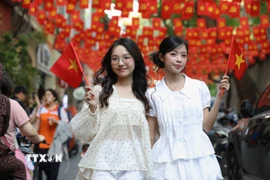 Lấy người dân làm trung tâm, bảo vệ và thúc đẩy các quyền cơ bản, gắn tăng trưởng với tiến bộ và công bằng xã hội cũng là quan điểm phát triển của Việt Nam được dư luận quốc tế đánh giá cao. (Ảnh: Lê Đông/TTXVN)