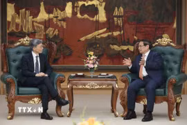 Thủ tướng Phạm Minh Chính tiếp ông Kenji Okamura, Phó Tổng Giám đốc Quỹ Tiền tệ Quốc tế (IMF). (Ảnh: Dương Giang/TTXVN)