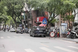 Một điểm trông giữ xe ở Hà Nội. (Ảnh: Thành Phương/TTXVN)