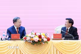 Tổng Bí thư Tô Lâm và Tổng Bí thư, Chủ tịch nước Lào Thongloun Sisoulith tại hội nghị. (Ảnh: Thống Nhất/TTXVN)