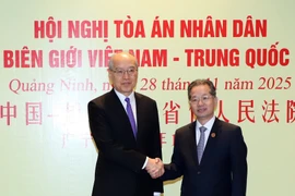 Ông Nguyễn Văn Quảng, Ủy viên Ban Chấp hành Trung ương Đảng Cộng sản Việt Nam, Chánh án Tòa án Nhân dân Tối cao Việt Nam và ông Trương Quân, Ủy viên Ban Chấp hành Trung ương Đảng Cộng sản Trung Quốc, Chánh án Tòa án Nhân dân Tối cao Trung Quốc. (Nguồn: Báo Công lý)