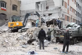 Những tòa nhà bị phá hủy sau các cuộc không kích của Israel nhằm vào thủ đô Tehran, Iran ngày 15/3/2026. (Nguồn: THX/TTXVN)