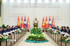 Tổng Bí thư Tô Lâm và Tổng Bí thư, Chủ tịch nước Lào Thongloun Sisoulith đồng chủ trì Cuộc gặp cấp cao giữa Đảng Cộng sản Việt Nam và Đảng Nhân dân Cách mạng Lào. (Ảnh: Thống Nhất/TTXVN)