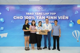 Chương trình tặng laptop đã được nhà trường triển khai từ năm 2024. (Nguồn: Vietnam+)