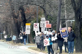 Người dân biểu tình phản đối ICE trên một tuyến phố của tiểu bang Maryland ngày 11/01/2026. (Ảnh: Ngọc Quang/TTXVN)