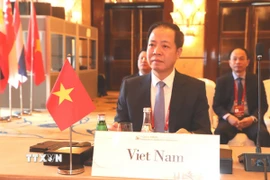 Phó Viện trưởng Viện Kiểm sát Nhân dân tối cao Việt Nam Trần Hải Quân tại lễ khai mạc hội nghị. (Ảnh: Xuân Vịnh/TTXVN)