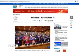 Tân Hoa xã đưa tin về Lễ khai mạc Đại hội XIV của Đảng Cộng sản Việt Nam. (Nguồn: TTXVN phát)