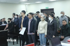Các bị cáo tại phiên tòa hôm 27/1. (Ảnh: Kim Anh/TTXVN)