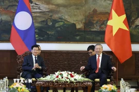 Tổng Bí thư Tô Lâm hội kiến Tổng Bí thư, Chủ tịch nước Lào Thongloun Sisoulith. (Ảnh: Thống Nhất/TTXVN)