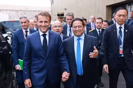 Thủ tướng Phạm Minh Chính hội kiến Tổng thống Pháp Emmanuel Macron. (Ảnh: Dương Giang/TTXVN)