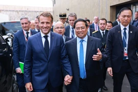 Thủ tướng Phạm Minh Chính hội kiến Tổng thống Pháp Emmanuel Macron. (Ảnh: Dương Giang/TTXVN)