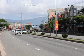 Không khí phấn khởi tại thành phố Đà Nẵng trong ngày khai mạc trọng thể Đại hội đại biểu toàn quốc lần thứ XIV của Đảng. (Ảnh: Xuân Quý/TTXVN)