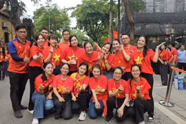 Đoàn viên đại diện cho tuổi trẻ TTXVN tham gia Khối Báo chí Cách mạng Việt Nam trong lễ diễu hành kỷ niệm 80 năm Quốc khánh 2/9. (Nguồn: Vietnam+)
