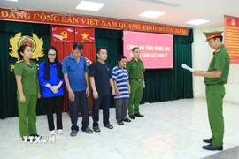 Cơ quan cảnh sát điều tra Công an tỉnh Đồng Nai công bố quyết định khởi tố và lệnh bắt bị can để tạm giam. (Nguồn: Công an Đồng Nai/ TTXVN phát)