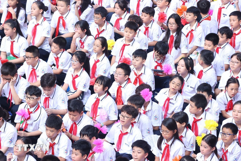 Học sinh Trường THCS Giảng Võ tại lễ khai giảng năm học mới 2024-2025. (Ảnh: Văn Điệp/TTXVN)
