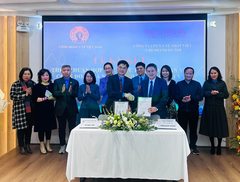 Công đoàn Y tế Việt Nam ký kết hợp tác chiến lược với Trung tâm tầm soát công nghệ cao Nura. (Ảnh: PV/Vietnam+)
