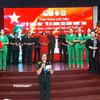Chương trình văn nghệ tri ân những người đã ngã xuống. (Ảnh: Minh Thu/Vietnam+)