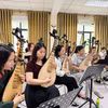 Các nghệ sỹ tại Hà Nội tập luyện chuẩn bị cho chương trình. (Ảnh: CTV/Vietnam+)