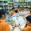 Thiếu nhi đọc sách tại Thư viện tỉnh Lạng Sơn trong ngày khai mạc Chương trình “Vui đọc sách hè” năm 2025. (Ảnh: Anh Tuấn/TTXVN)