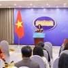 Người phát ngôn Bộ Ngoại giao Phạm Thu Hằng trả lời câu hỏi của các cơ quan báo chí trong nước và quốc tế. (Ảnh: Minh Đức/TTXVN)