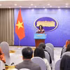 Người phát ngôn Bộ Ngoại giao Phạm Thu Hằng trả lời câu hỏi của các cơ quan báo chí trong nước và quốc tế. (Ảnh: Minh Đức/TTXVN)