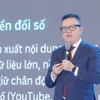 Ông Lê Quốc Minh, Phó trưởng Ban Tuyên giáo và Dân vận Trung ương, Chủ tịch Hội Nhà báo Việt Nam, Tổng Biên tập báo Nhân dân trình bày tham luận tại Diễn đàn. (Ảnh: Minh Quyết/TTXVN)