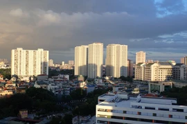 Trong thời gian tới, các Bộ, ngành, địa phương tiếp tục thực hiện các nhiệm vụ giải pháp để phát triển ổn định thị trường bất động sản. (Ảnh: Vietnam+)