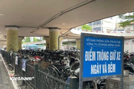 Một điểm trông giữ xe dưới gầm cầu Chương Dương, thành phố Hà Nội. (Ảnh: Việt Hùng/Vietnam+)