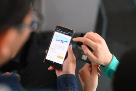 Dịch vụ Internet trên máy bay cho phép hành khách dễ dàng truy cập và sử dụng các tiện ích trực tuyến trong suốt chuyến bay. (Ảnh: PV/Vietnam+)