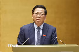 Bộ trưởng Bộ Xây dựng Trần Hồng Minh giải trình ý kiến Đại biểu Quốc hội về Dự án đường Vành đai 5-Vùng Thủ đô. (Ảnh: Doãn Tấn/TTXVN)