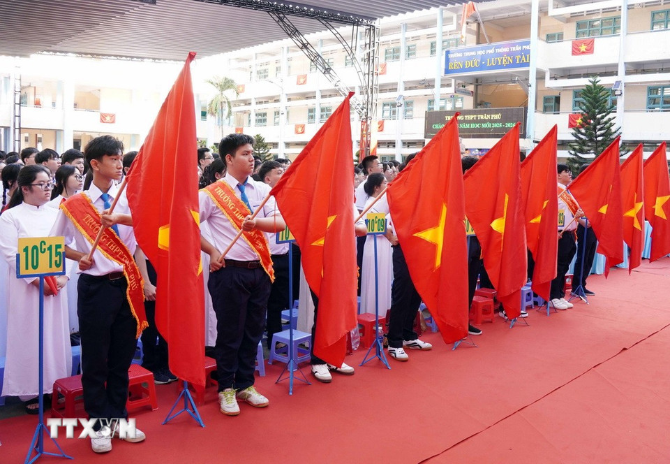 Khai giảng năm học mới tại Trường Trung học phổ thông Trần Phú (phường Phú Thọ Hoà, Thành phố Hồ Chí Minh). (Ảnh: Trung Tuyến/TTXVN)