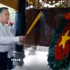 Tổng Bí thư, Chủ tịch nước Tô Lâm dâng hương tại Nhà bia tưởng niệm các Anh hùng liệt sỹ. (Ảnh: Thống Nhất/TTXVN)