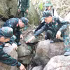 Khu vực hài cốt liệt sĩ được Bộ Chỉ huy Quân sự thành phố Đà Nẵng tìm thấy tại Hang Đá Sập, xã Hà Nha. (Ảnh: Khoa Chương/TTXVN)