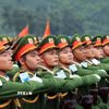 Mỗi bước trưởng thành, mỗi chiến công của lực lượng Công an nhân dân đều gắn với những chặng đường lịch sử của đất nước, với sự nghiệp bảo vệ Đảng, Nhà nước, chế độ và cuộc sống bình yên, hạnh phúc của Nhân dân. (Ảnh: Tuấn Anh/TTXVN)