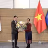 Đại sứ Lào Kaimani Orabun chúc mừng cán bộ, nhân viên Đại sứ quán Việt Nam tại Hàn Quốc nhân dịp Tết Nguyên đán Bính Ngọ 2026. (Ảnh: Khánh Vân/TTXVN)