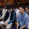 Các bị cáo tại phiên tòa. (Ảnh: Hồng Đạt/TTXVN)