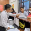 Sau hơn một năm, chính quyền địa phương hai cấp đã qua bước sắp xếp ban đầu, nay phải tập trung vào chất lượng vận hành. (Ảnh: Nguyễn Chinh/TTXVN)