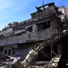 Tòa nhà bị trúng không kích của Israel tại Damascus, Syria. (Ảnh: THX/TTXVN)