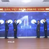 Bí thư Tỉnh ủy Thanh Hóa Nguyễn Doãn Anh, Chủ tịch Ủy ban Nhân dân tỉnh Nguyễn Hoài Anh cùng các đại biểu ấn nút vận hành chính thức Trung tâm IOC Thanh Hóa. (Ảnh: TTXVN phát)