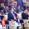 Đại tướng Lương Tam Quang, Bộ trưởng Bộ Công an với các đại biểu tham dự Hội nghị. (Ảnh: Phạm Kiên/TTXVN)