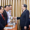 Chủ tịch Quốc hội Trần Thanh Mẫn với đại biểu dự Lễ công bố Nghị quyết. (Ảnh: Doãn Tấn/TTXVN)