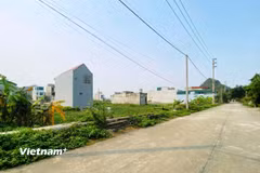 Việc đánh thuế phần chênh lệch lãi giữa các lần giao dịch bất động sản sẽ hạn chế tình trạng đầu cơ, thổi giá trên thị trường. (Ảnh: Việt Hùng/Vietnam+)