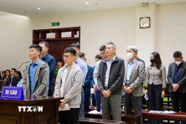 Các bị cáo tại phiên tòa phúc thẩm. (Ảnh: Phạm Kiên/TTXVN)