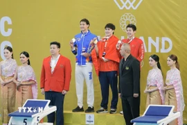 Trần Hưng Nguyên xuất sắc giành huy chương Vàng, Nguyễn Quang Thuấn giành huy chương Đồng với thành tích 2 phút 04,19 giây. (Ảnh: Minh Quyết/TTXVN)