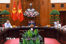 Thủ tướng Phạm Minh Chính chủ trì cuộc họp với các bộ, ngành để chuẩn bị đàm phán thương mại với Hoa Kỳ. (Ảnh: Dương Giang/TTXVN)